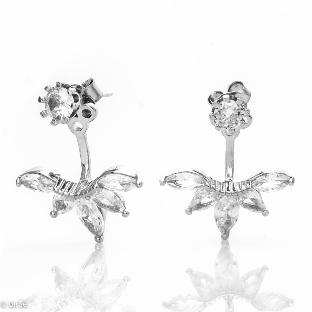 Spectacular women's jewelry - rhodium-plated silver earrings in combination with shiny zircons. The model consists of two parts, made with a modern and stylish look.