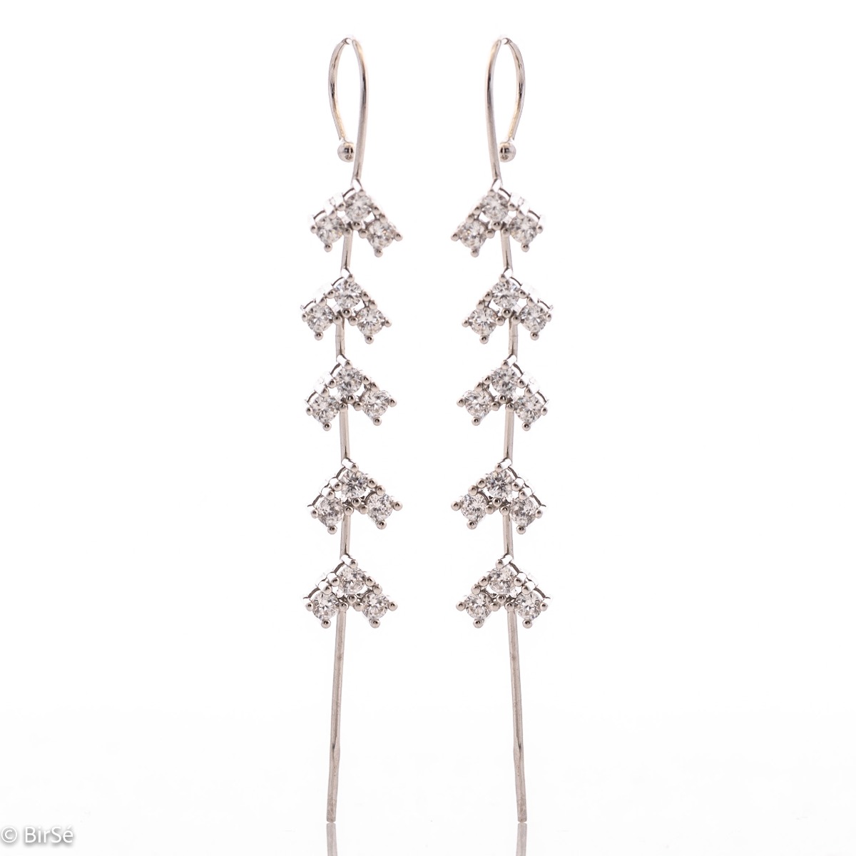 Eccentric women's earrings "Amazing" made of fine rhodium silver, with an interesting design layout, resembling a branch with leaves of zircons. The earrings are hairpin type, with piercing fastening. Extremely sexy style, suitable gift for girls and wome