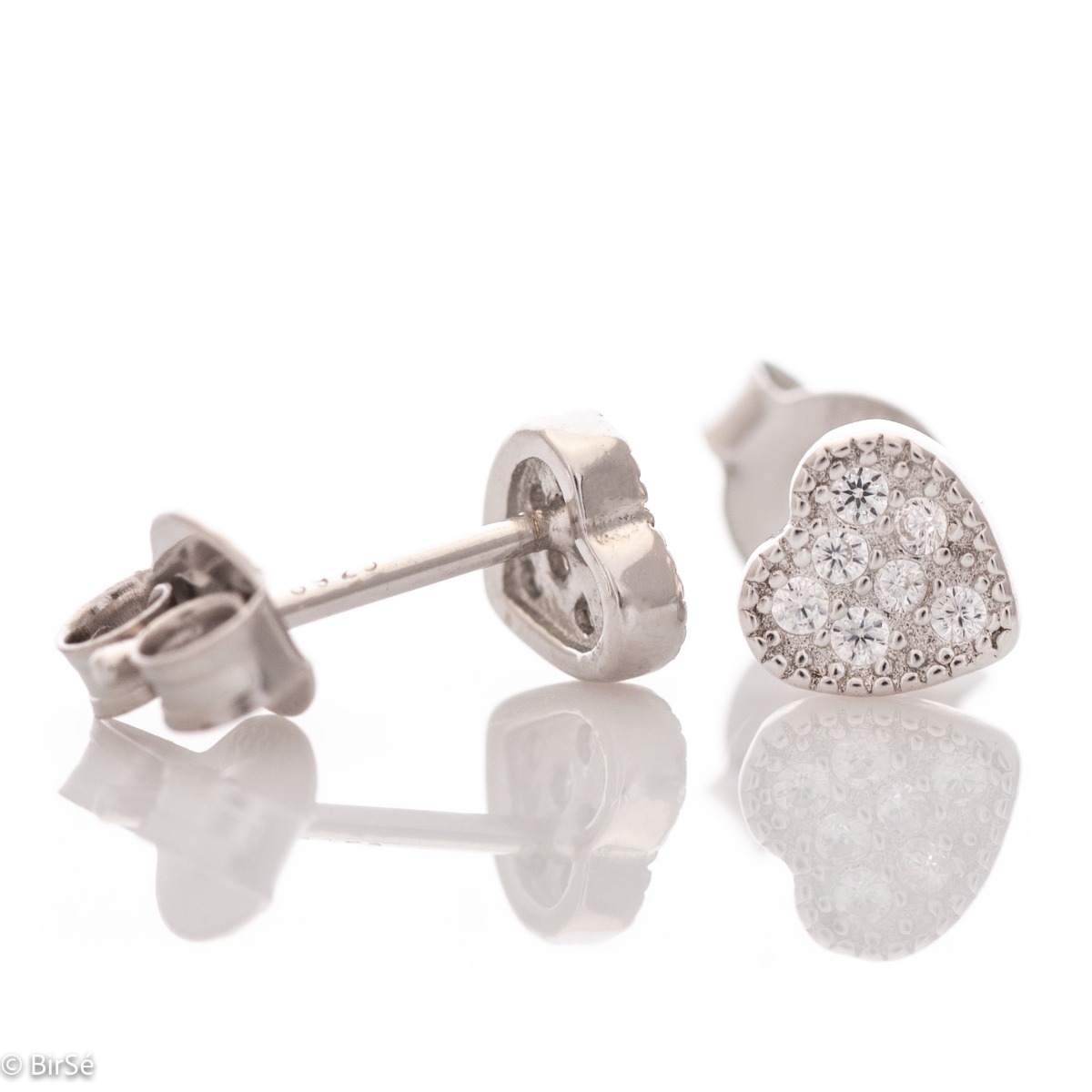 Charming women's heart earrings, masterfully crafted from fine rhodium silver with an elegant design. The elements are beautifully sculpted, dazzling zircons sparkle charmingly, and the pin fastening is comfortable and practical.