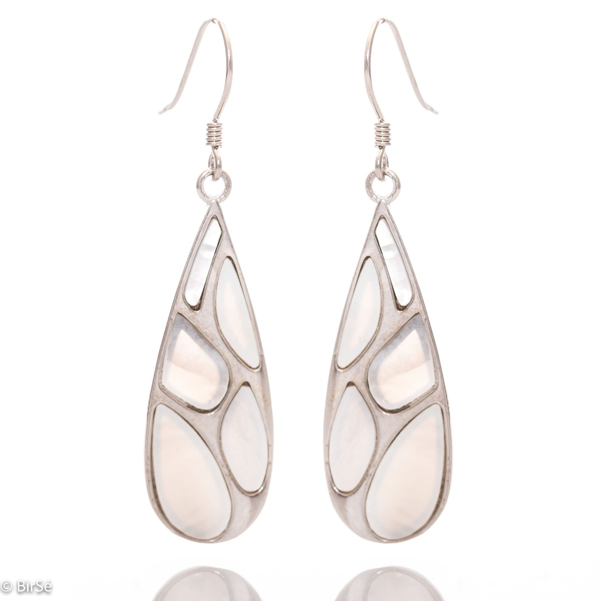 An elegant performance of women's drop-shaped dangling earrings, the entire production of which is made of fine rhodium silver, with added elements of delicate mother-of-pearl. A beautiful jewel for your earring collection.