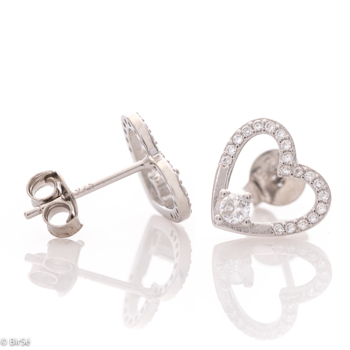 A stylish model of women's earrings with an elegant heart design, completely formed by combining rhodium-plated silver with sparkling zircons. The fastening is with a pin - comfortable and practical. A beautiful look for your special moments with BirSe ea