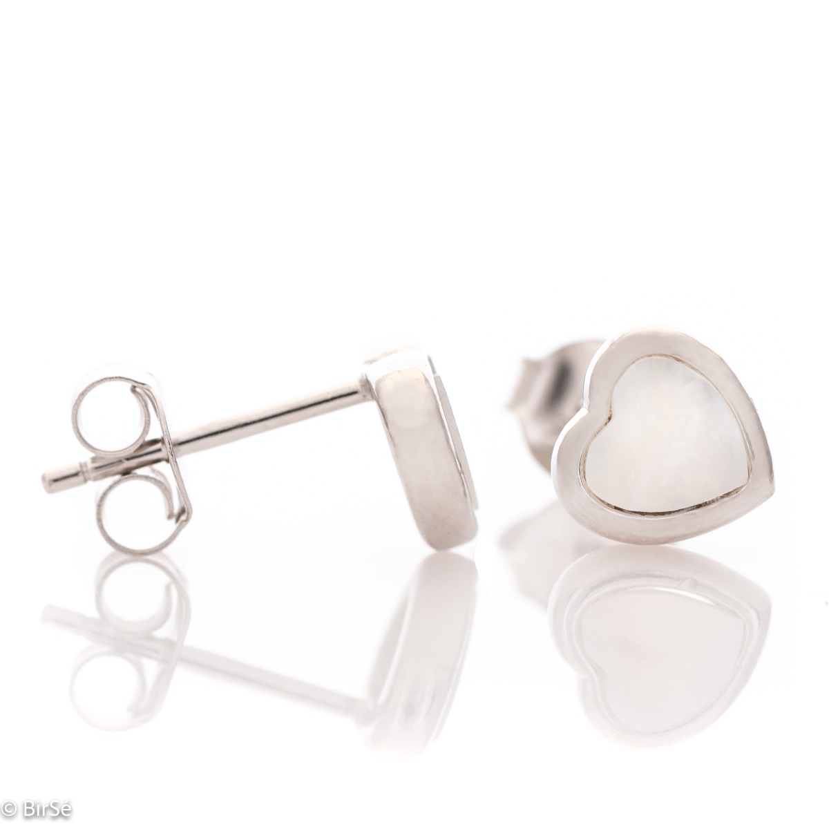 Captivating women's earrings with an elegant heart design, completely formed by a combination of rhodium-plated silver with sparkling mother-of-pearl. The fastening is with a pin - comfortable and practical. A beautiful look for your special moments with 