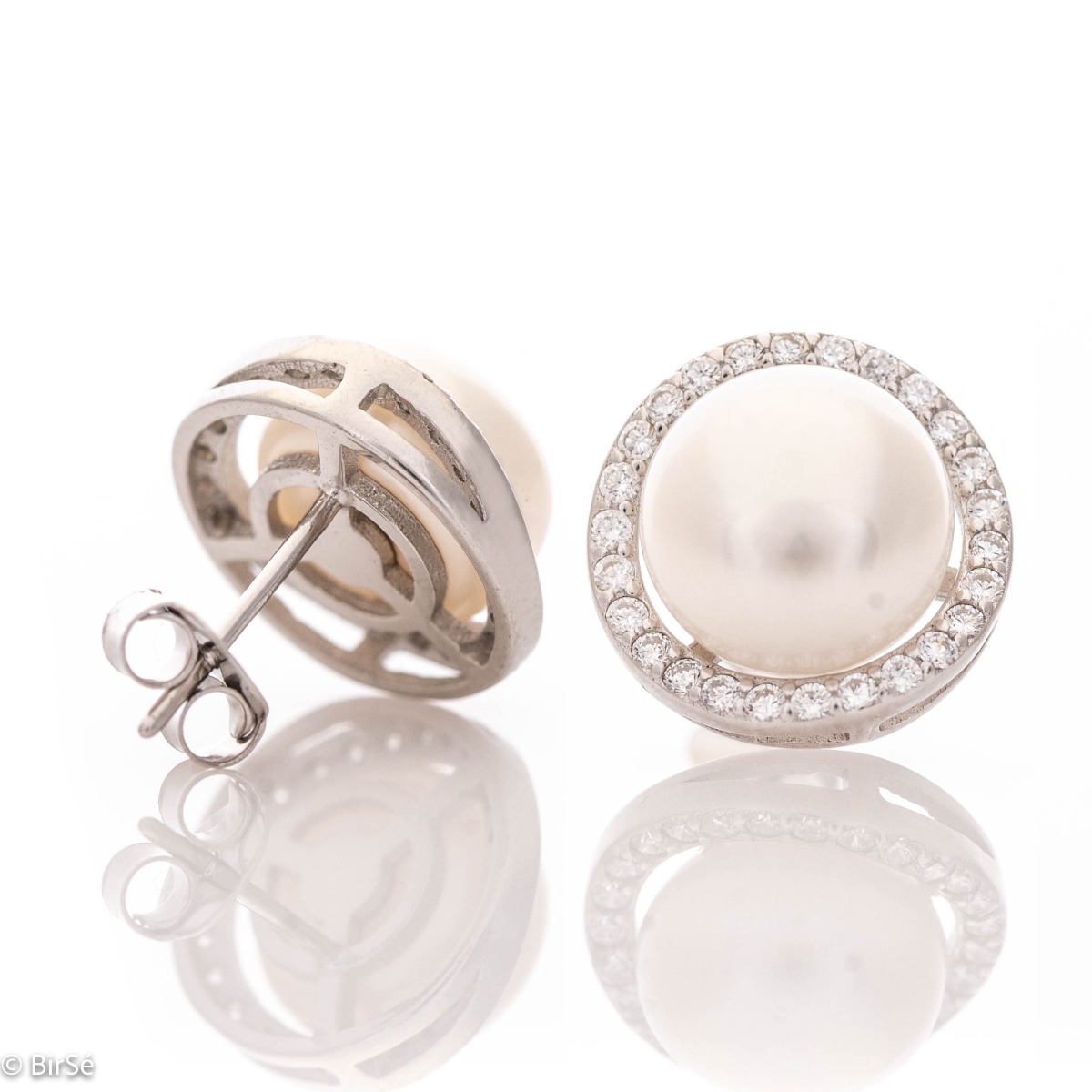 Stylish women's earrings, exquisitely crafted from fine rhodium silver. A captivating natural pearl is at the base of the earrings, charmingly surrounded by sparkling zircons. A suitable piece of jewelry for your special moments.