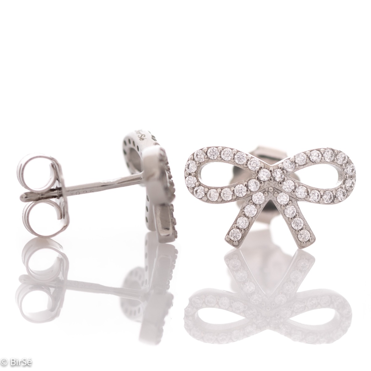 Exquisite craftsmanship of our new stud earrings and beautiful ribbon design combining unique rhodium silver and cubic zirconias.