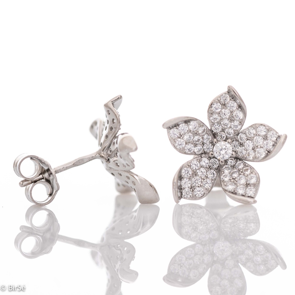 Captivating design of women's flower stud earrings with a charming design, all rhodium-plated silver, covered with delicate, sparkling cubic zirconias.