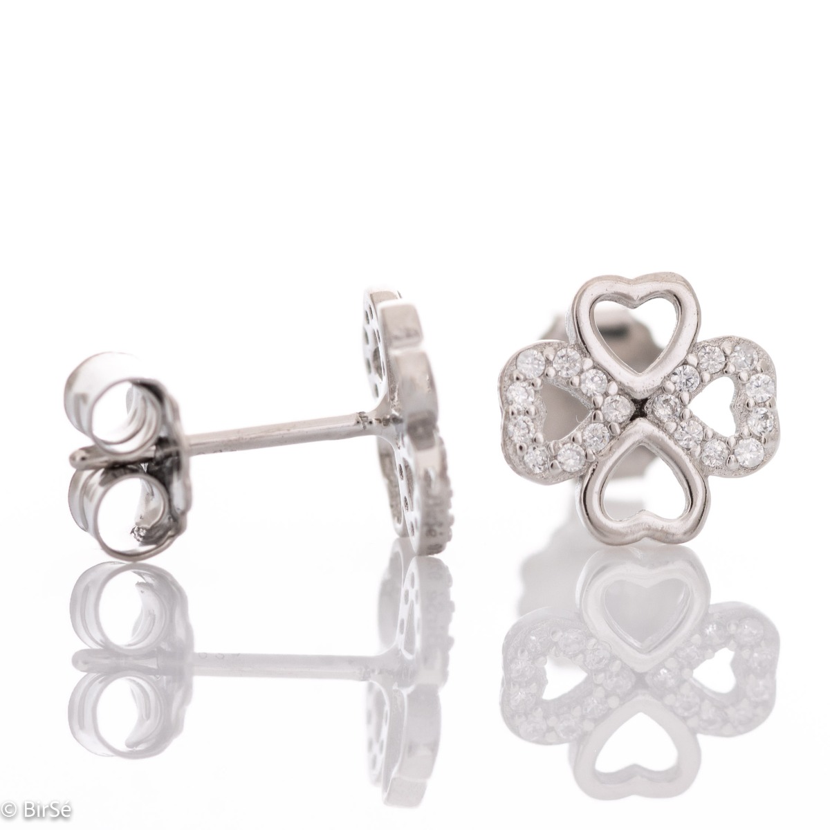 Brilliant craftsmanship of delicate clover earrings with charming design. Made entirely of rhodium-plated silver, hearts connect to form the lucky flower, beautifully decorated with the sparkle of zircons.