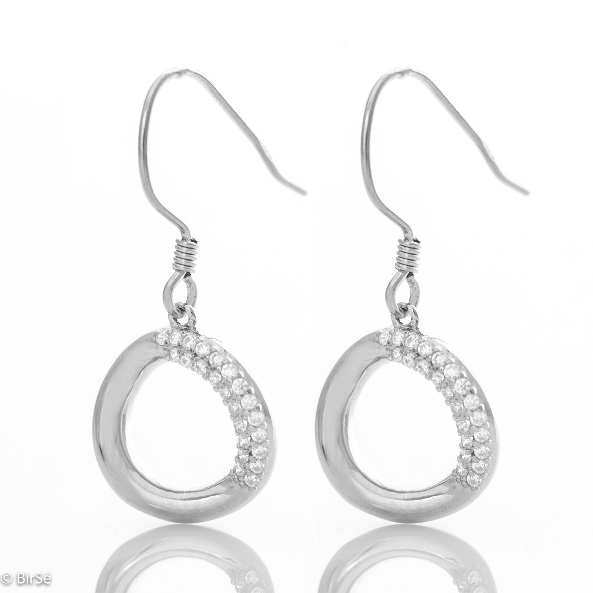 Delicate dangle earrings with a charming design in rhodium-plated silver, decorated with sparkling zircons. The willow fastening is easy and preferred by ladies as it is comfortable and practical.