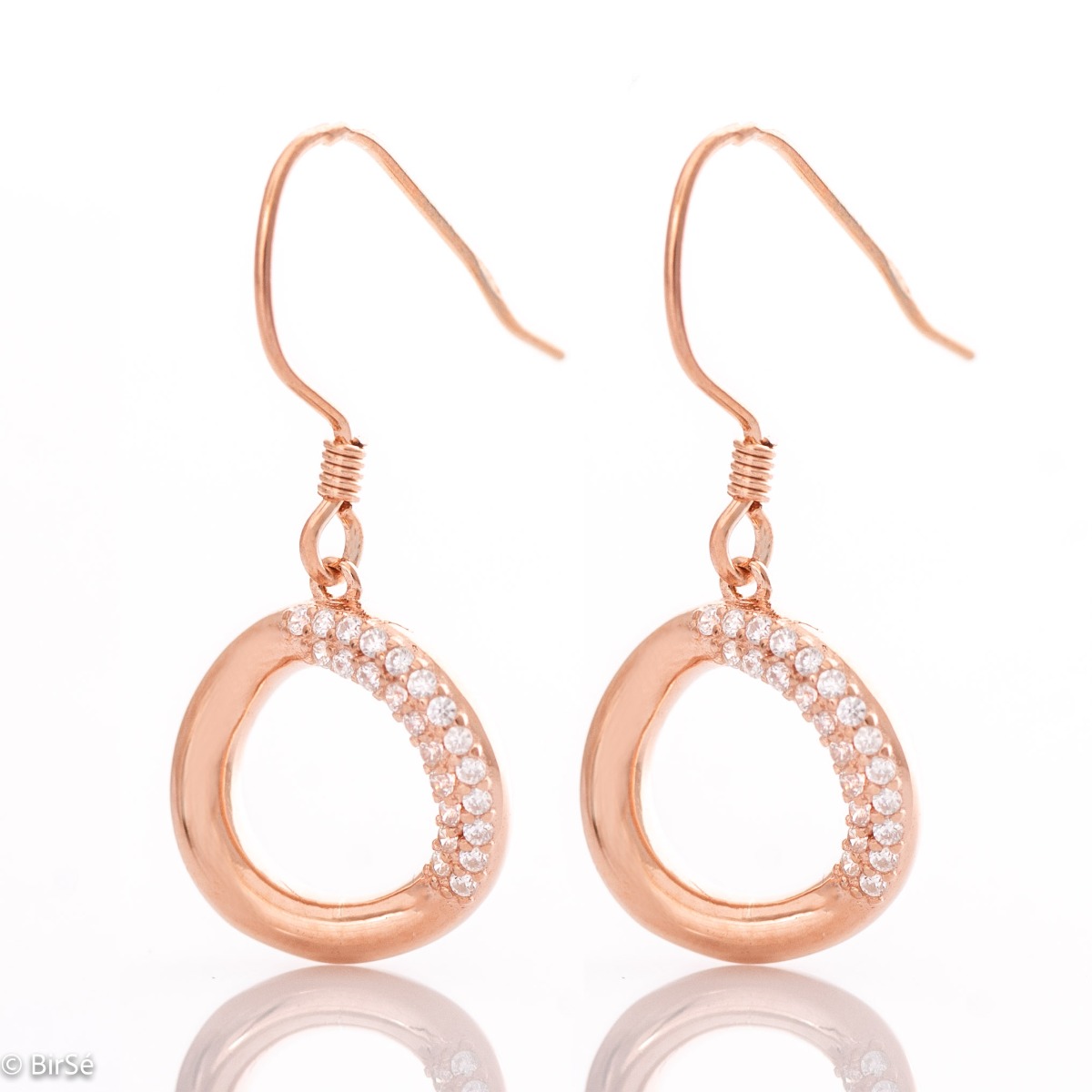 Delicate dangle earrings with a charming design in rose silver, decorated with sparkling zircons. The willow fastening is easy and preferred by ladies as it is comfortable and practical.