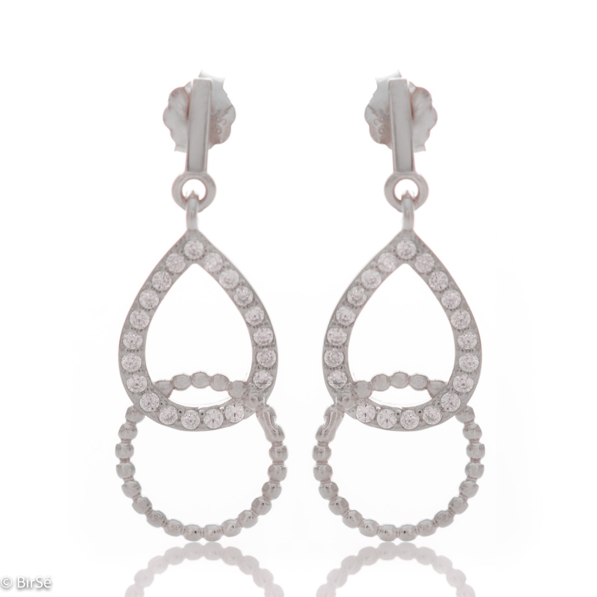 Delicate dangling earrings in fine rhodium-plated silver, with elements decorated with sparkling zircons. Pin fastening - fast, comfortable and preferred by the ladies.