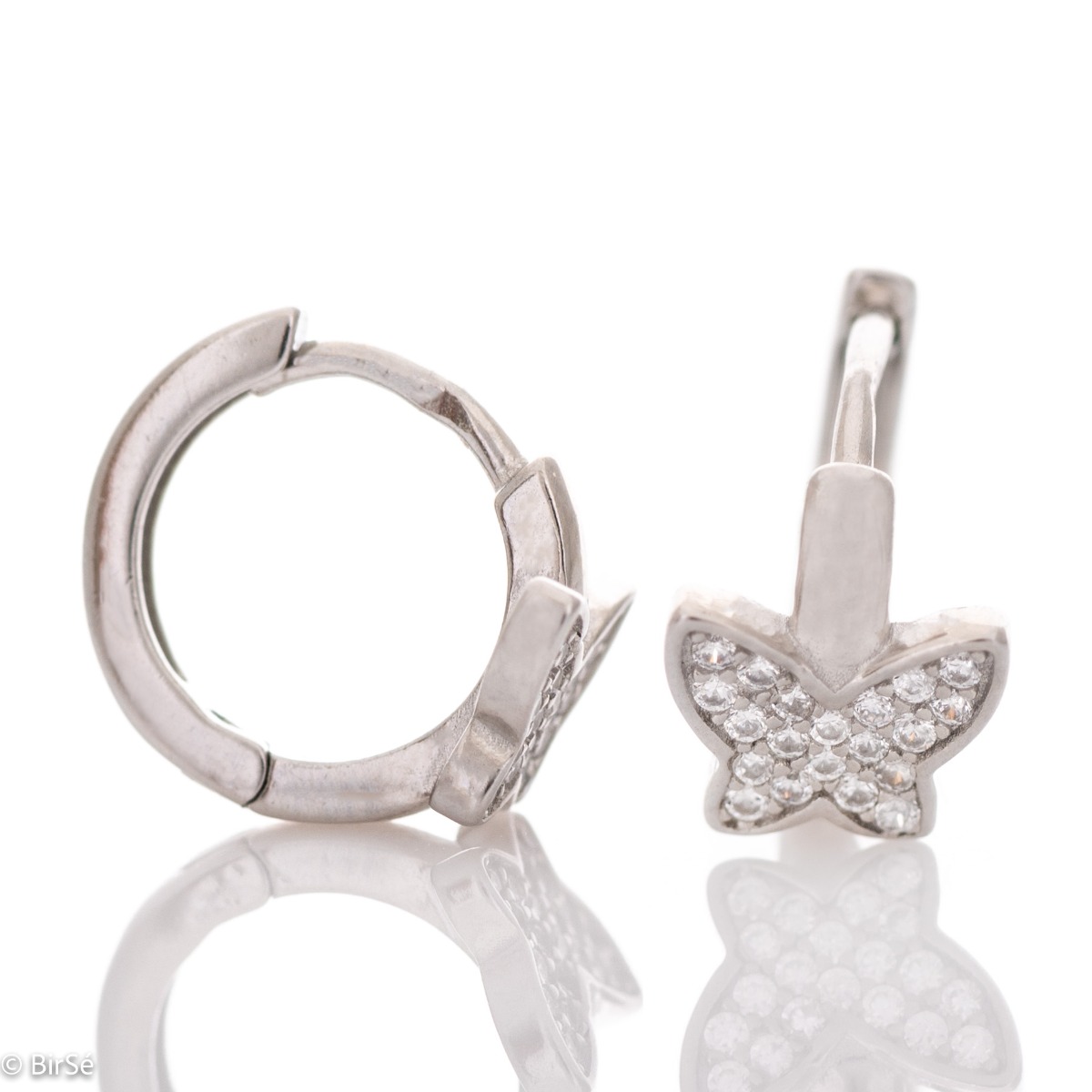 Fine women's earrings in sparkling rhodium silver and zircons, with a delicate butterfly on an elegant hoop. English fastening - preferred for children and comfortable for ladies.