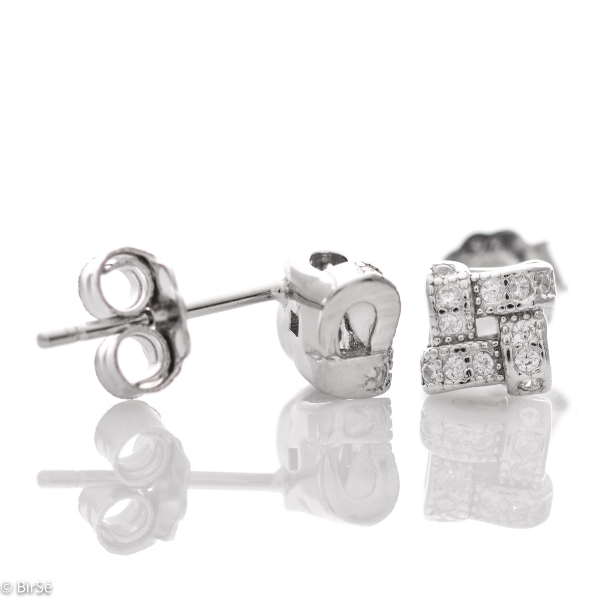 Stylish women's earrings with a modern design, made entirely of soft rhodium silver and shiny zircons, with a pin fastening that is convenient for your everyday life. A suitable gift for stylish ladies.