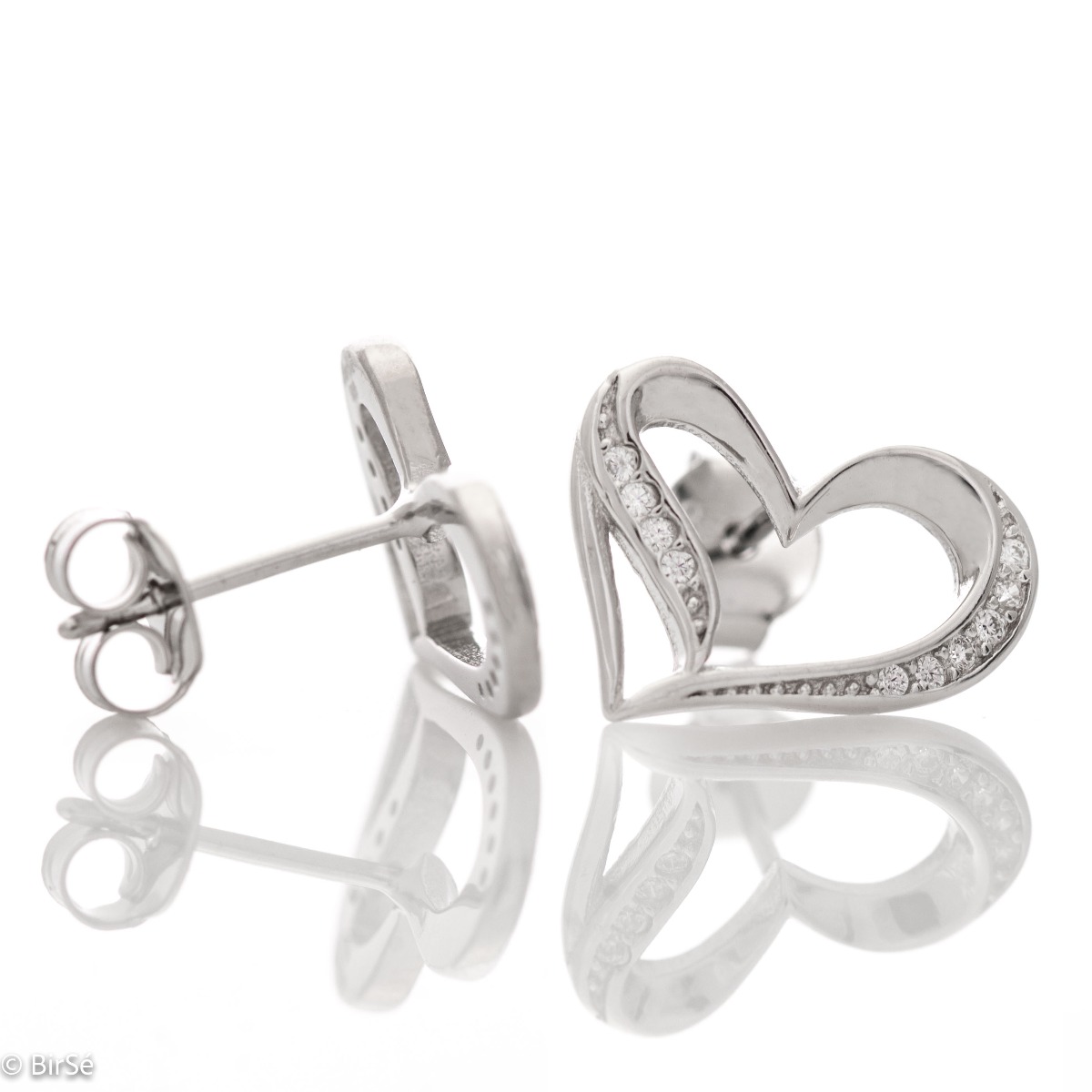 Delightful earrings with a stylish heart design, made entirely of sparkling rhodium silver. The added sparkling zircons make the jewelry extremely attractive. An ideal gift for the beloved woman.