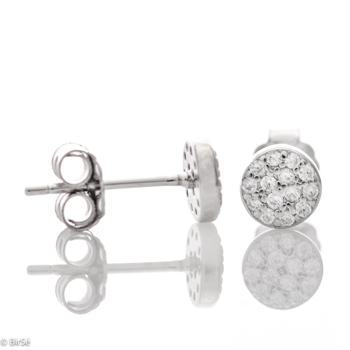 Extremely simple hoop earrings, made entirely of rhodium silver and sparkling zircons, with a pin fastening.