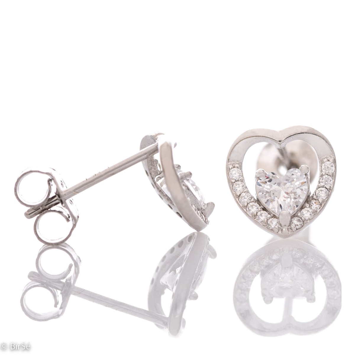 Exquisite heart-shaped sterling silver earrings delicately encase a smaller sparkling cubic zirconia heart. Fastening with a pin is for more convenience, and the earrings are a suitable gift for the beloved girl