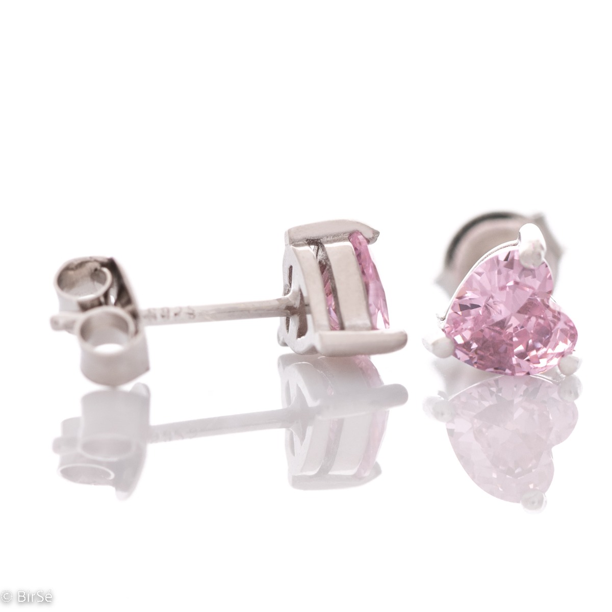 Exquisite earrings made of fine silver in the shape of a heart, in a delicate combination with an enchanted pink zircon. Fastening with a pin is for more convenience, and the earrings are a suitable gift for the beloved girl.