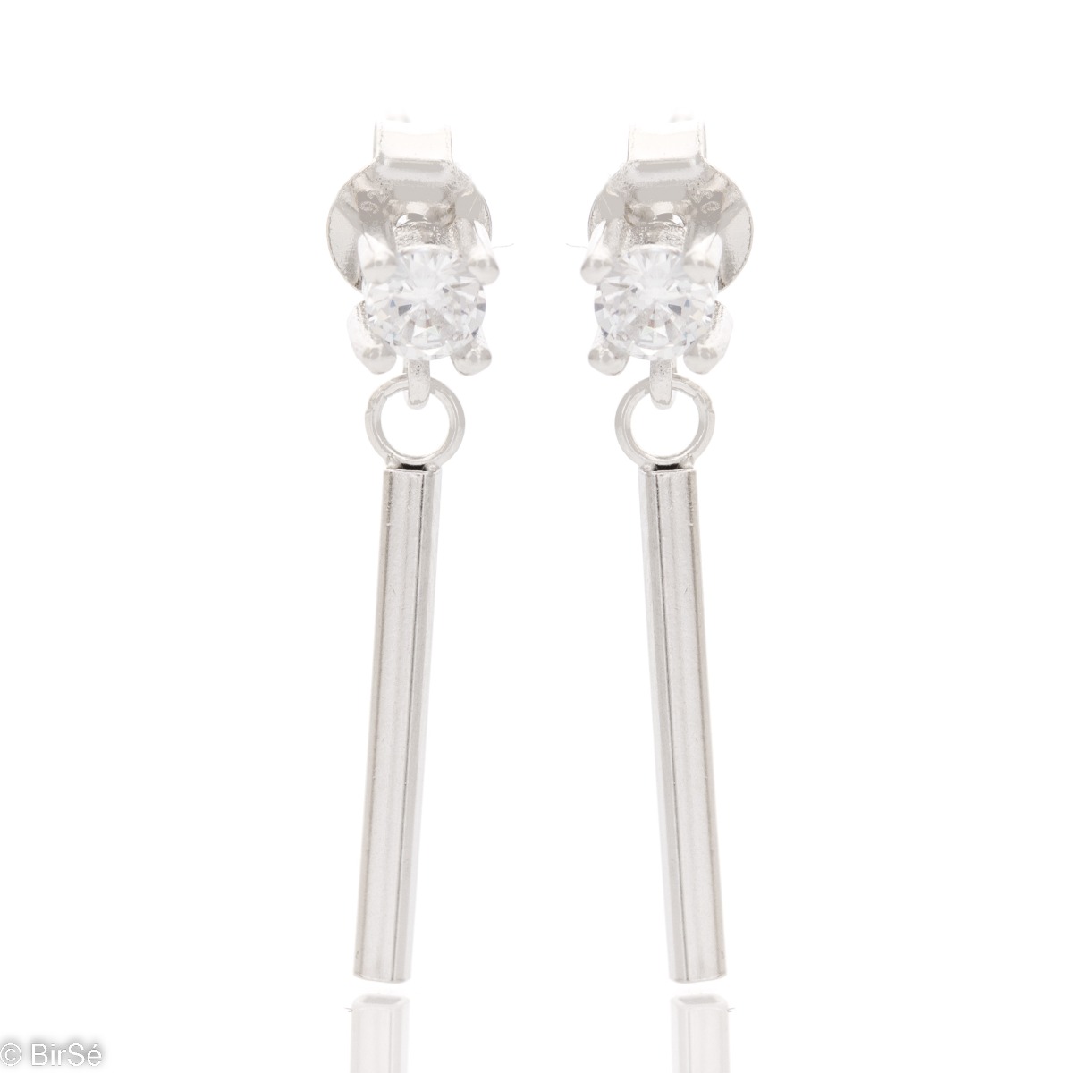 A stylish model of women's dangling earrings made of rhodium silver, a spectacular combination of fine pendant and shiny zircon. The earrings are suitable for an everyday outfit. The fastening is with a pin for greater convenience.