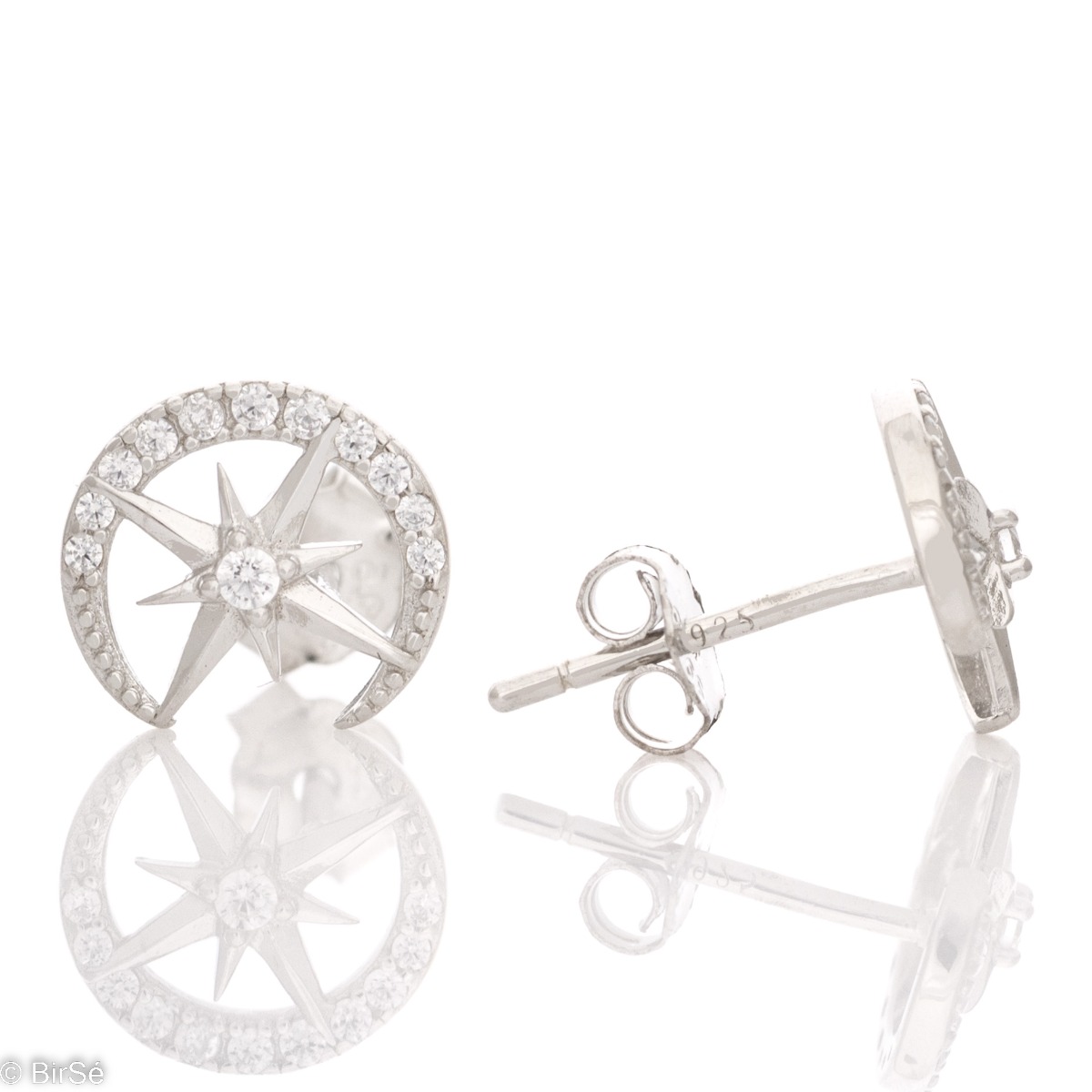 Shiny women's earrings, with a complete rhodium-plated silver finish and the subtle presence of delicate zircons. The earrings are fastened with a pin - comfortable and practical for your everyday life.