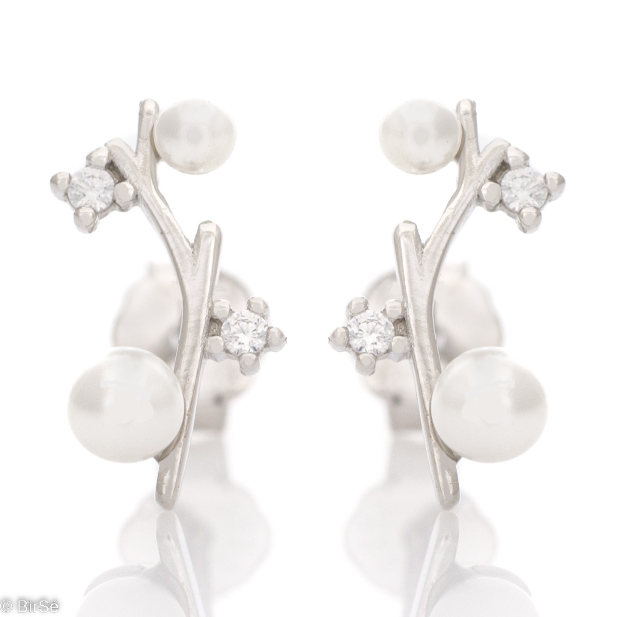 Tenderness and subtle beauty is offered by BirSe with the new model of earrings made of rhodium silver, white pearls and shiny zircons. Earrings are suitable jewelry for more special occasions for ladies who love the exquisite beauty of pearls.