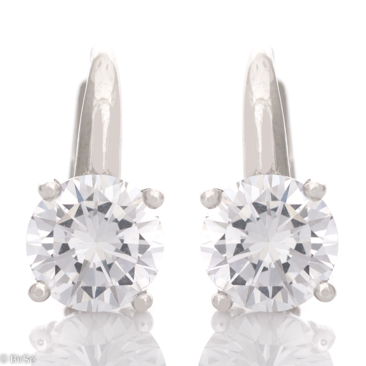 Stylish silver earrings with a comfortable willow clasp, suitable for children and ladies of all ages. Dazzling zircons are the main accent in the jewelry and give it an elegant charm.