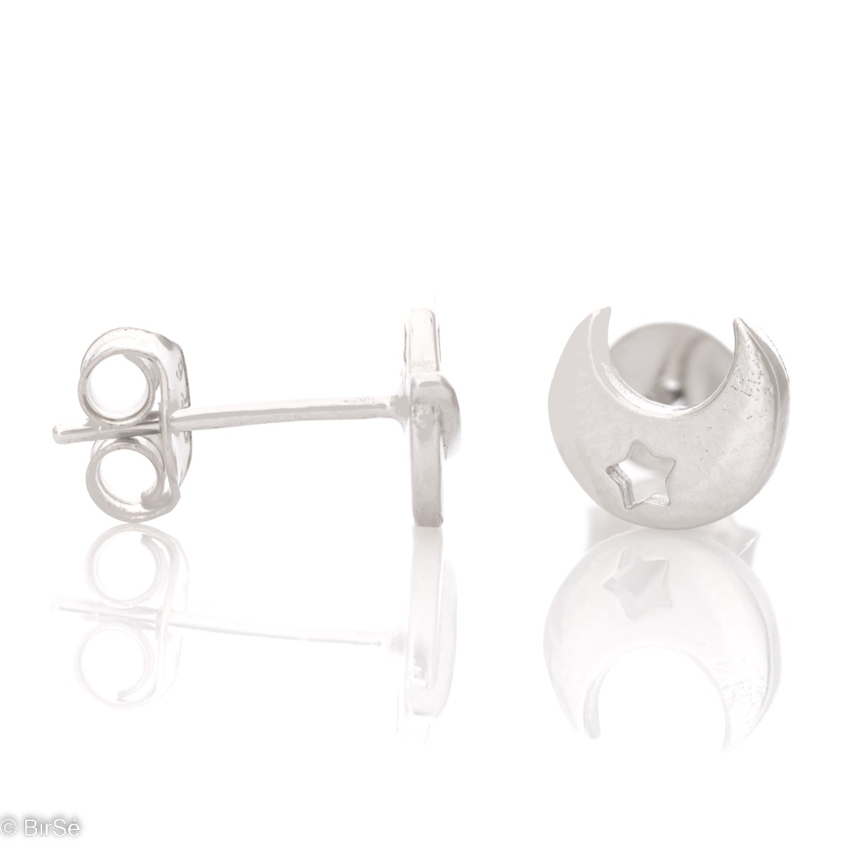 Small earrings in fine rhodium silver with a vision of celestial bodies and stars. The earrings have a pin fastening and are suitable for all ages.