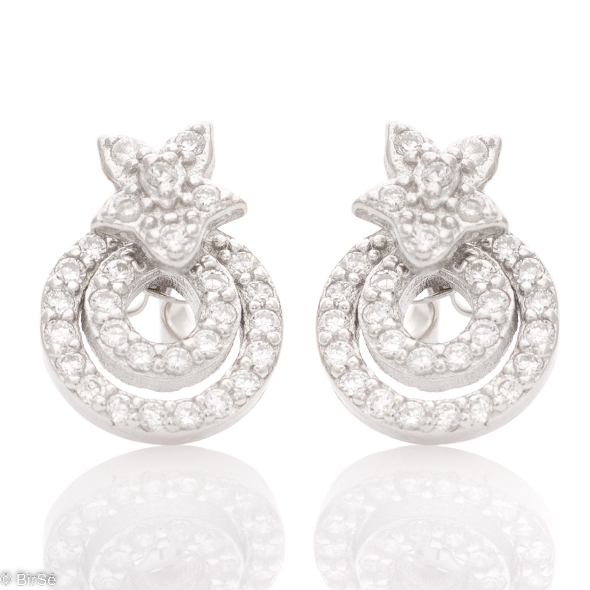 Spectacular design of women's earrings in rhodium silver with the sparkle of countless zircons. The earrings are made of two elements that separate, so you have two models of earrings. Pin fastening for convenience and security.