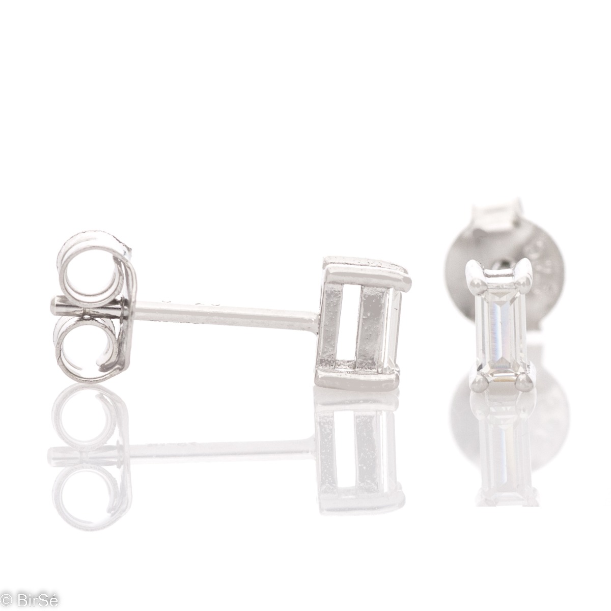 Elegant women's earrings in rhodium-plated silver with a pin clasp and sparkling baguette-shaped zircons. Stylish earrings with a delicate look, suitable for ladies of all ages.