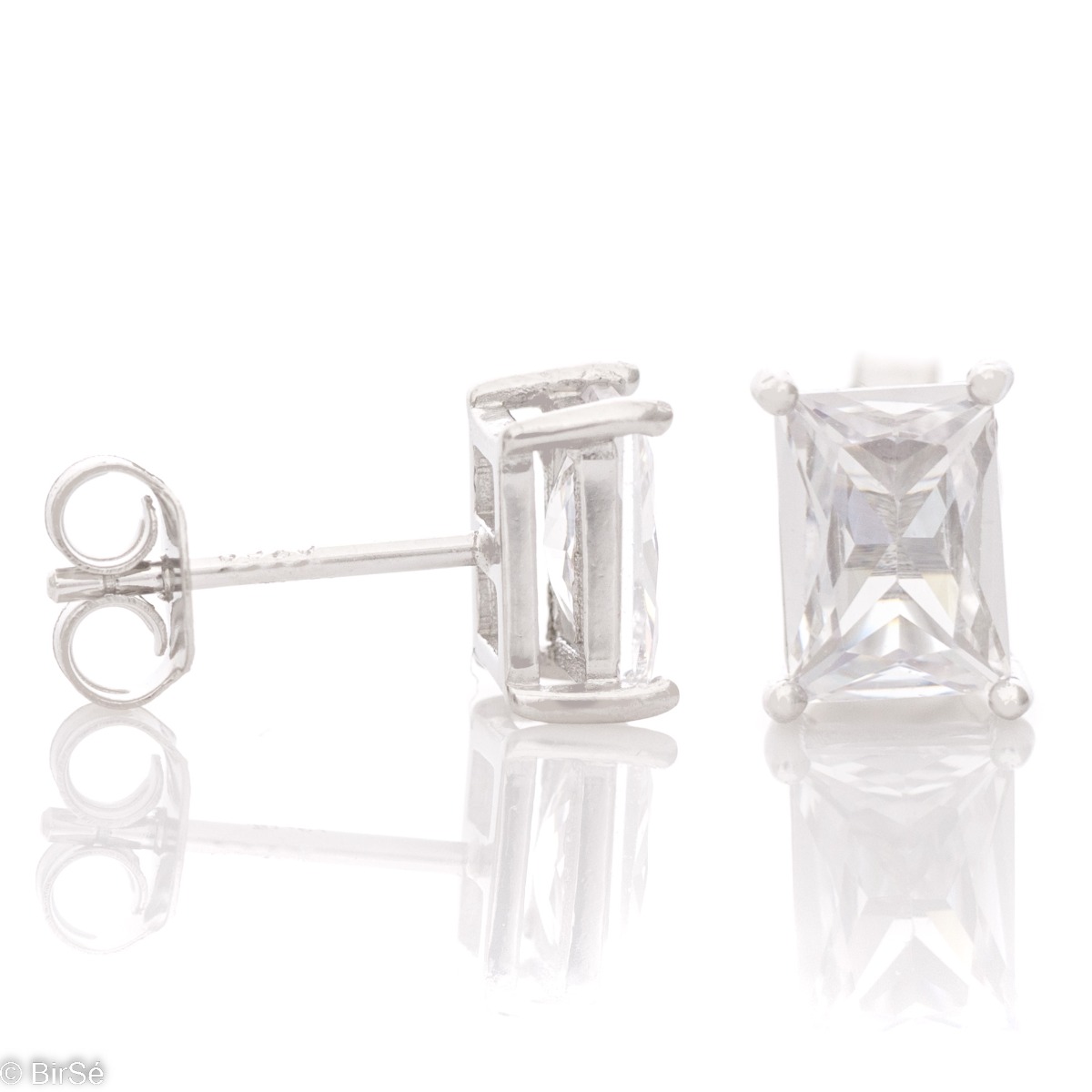 Elegant women's earrings in rhodium-plated silver with a pin clasp and sparkling baguette-shaped zircons. Stylish earrings with a delicate look, suitable for ladies of all ages.