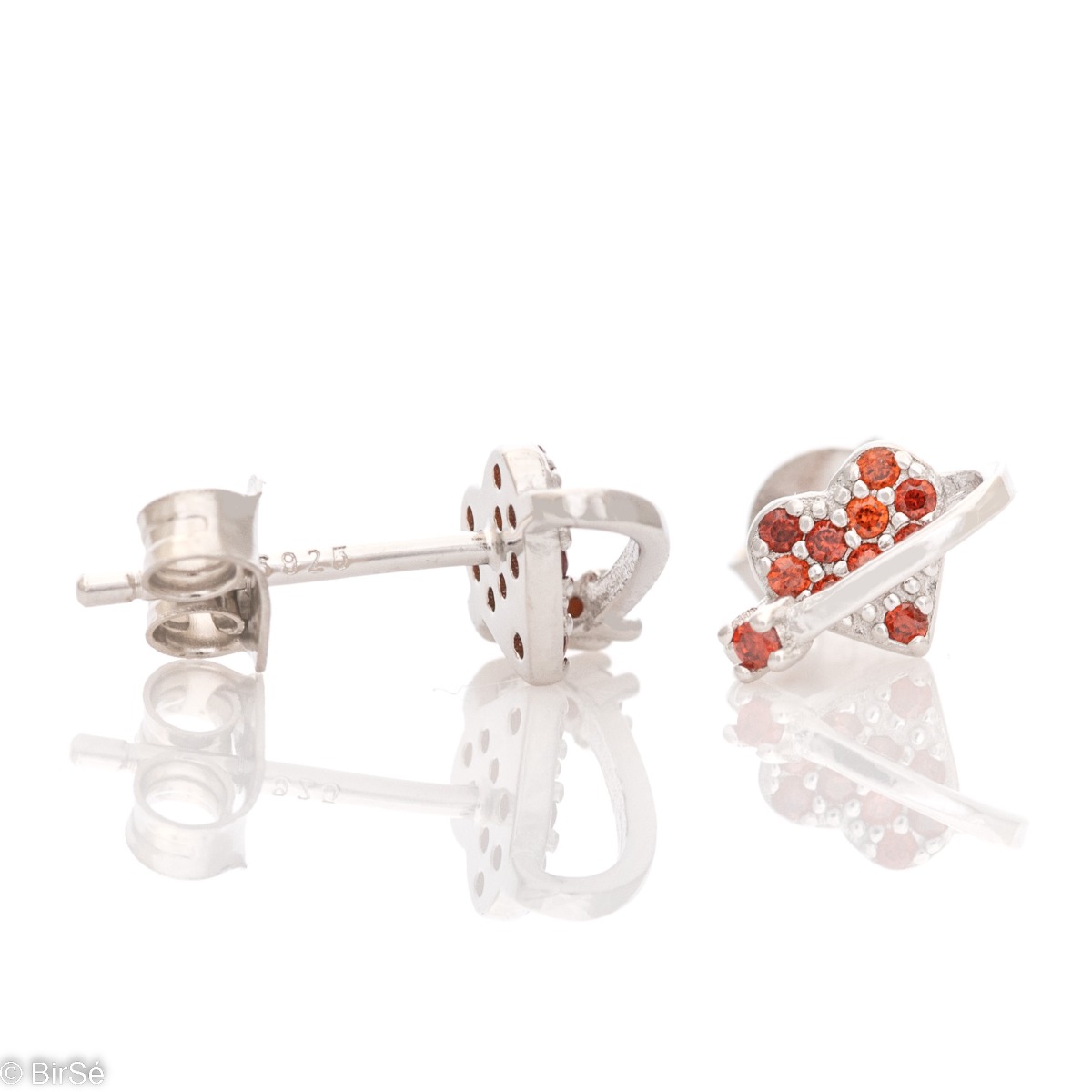 Small spectacular earrings made of classic rhodium-plated silver - a heart with colored zircons. Simple and elegant, the earrings can be combined with other zircon jewelry.