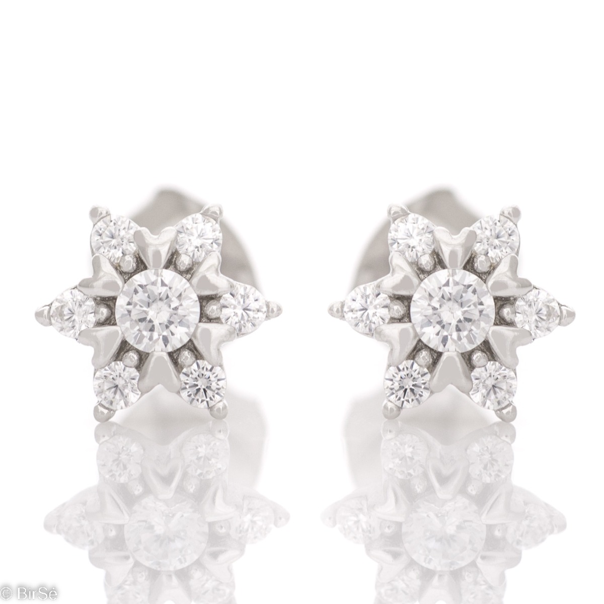 Captivating women's floral style earrings made of soft silver, elegantly combined with dazzling zircons. The fastening is with a pin for more comfort, so they are also suitable for little girls.