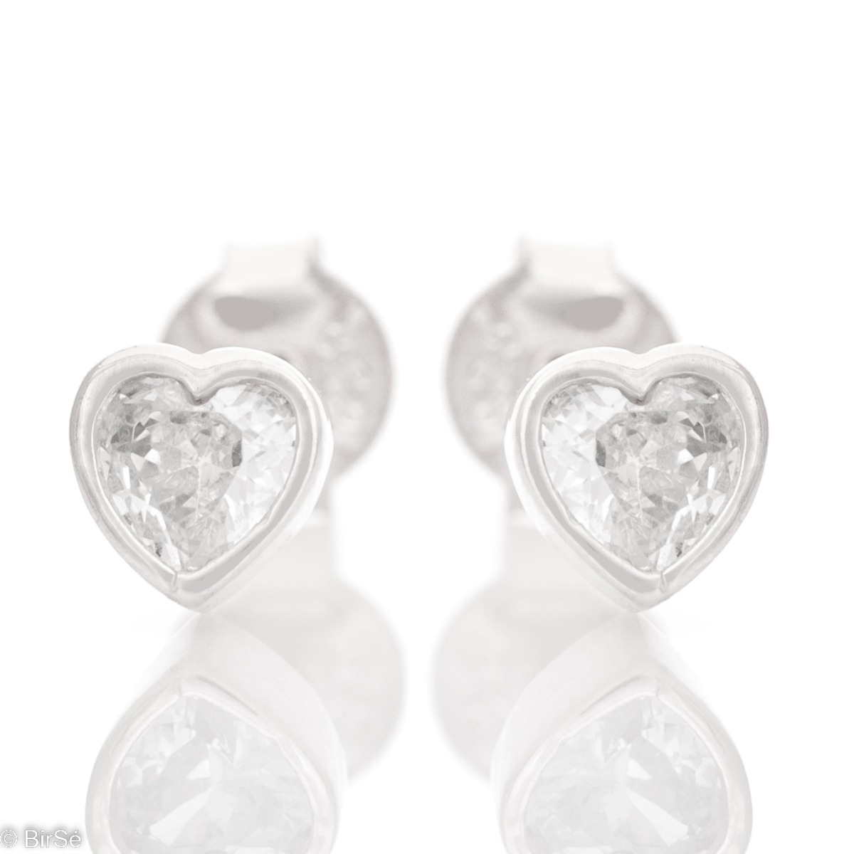 Delicate hearts surrounding a sparkling zircon - our new women's stud earrings with precision craftsmanship entirely in rhodium-plated silver. Suitable for small and large ladies.