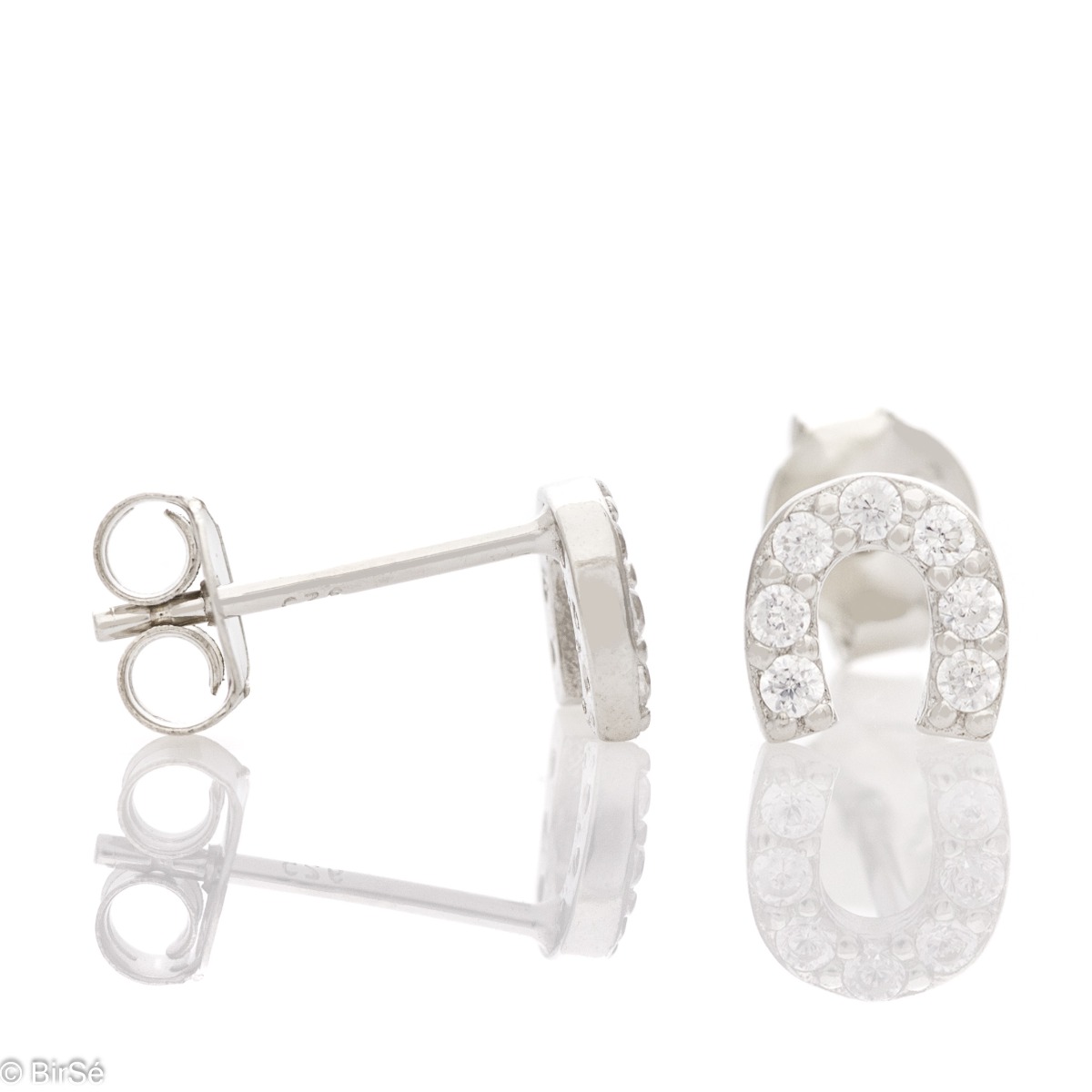 Finely crafted ladies' earrings in soft rhodium-plated silver with a horseshoe shape. Shiny zircons adorn the earrings and give them extra charm. Fastening with a pin - convenient and secure.