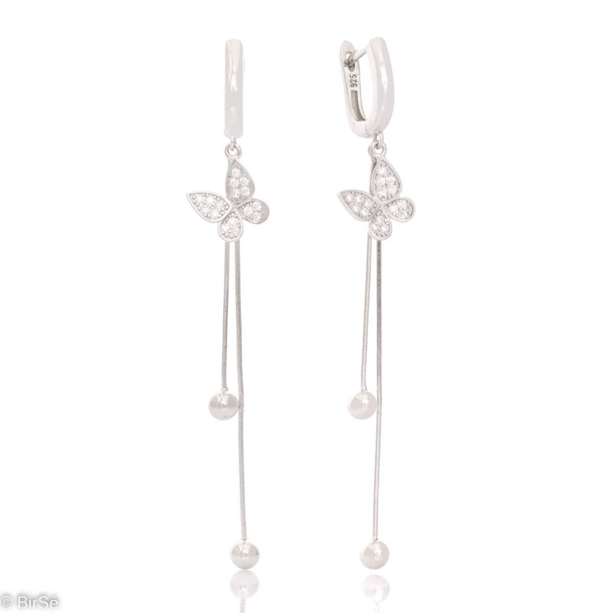 Exquisite dangle earrings for ladies who like butterfly jewelry. Crafted from elegant rhodium-plated silver, butterflies beautifully sparkle from the zircons that adorn them. And fine chains with balls at the end complete the design and add extra charm.