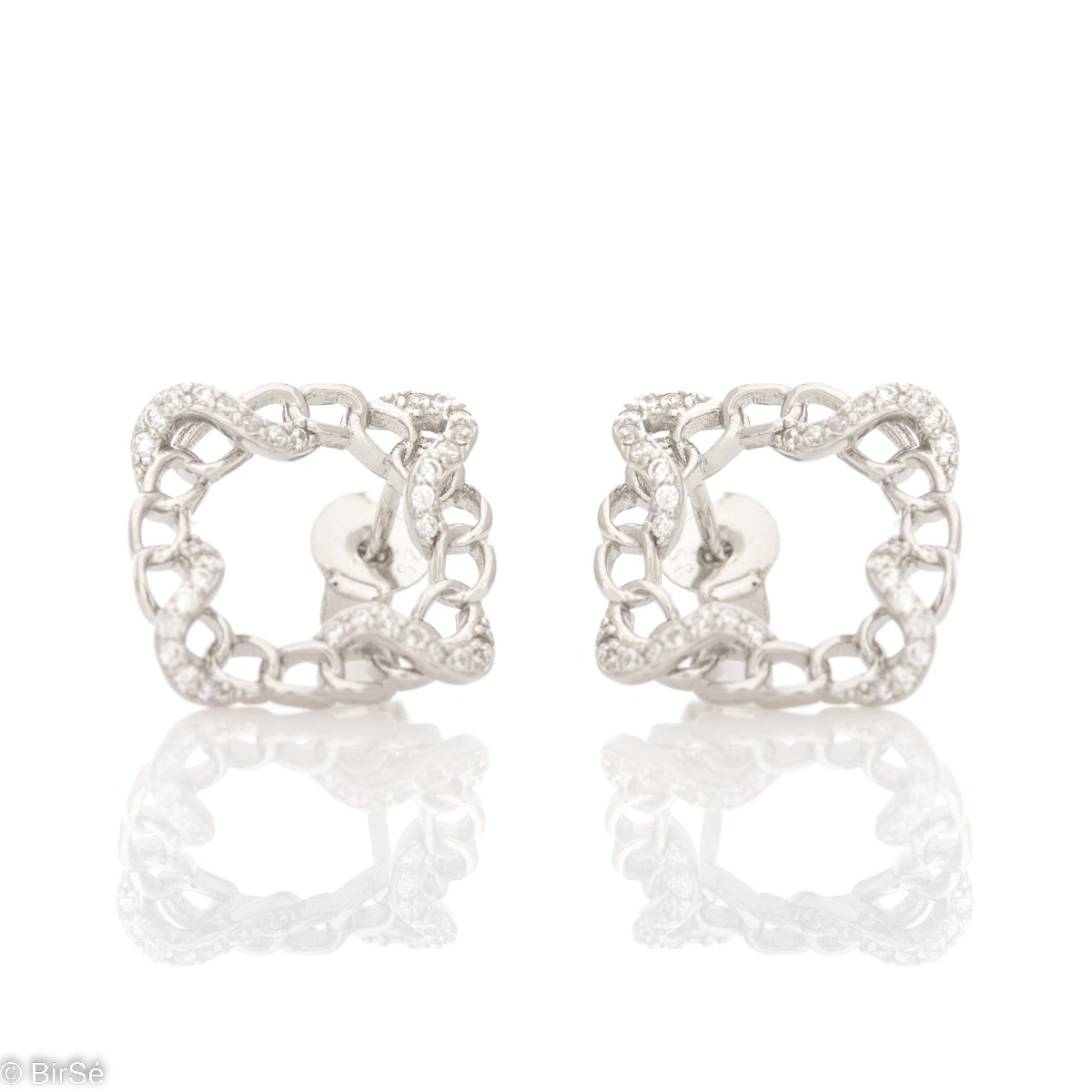 Charming women's stud earrings, elegantly shaped as a beautiful tangle of fine rhodium silver and sparkling zircons. Earrings suitable for every day and occasion.