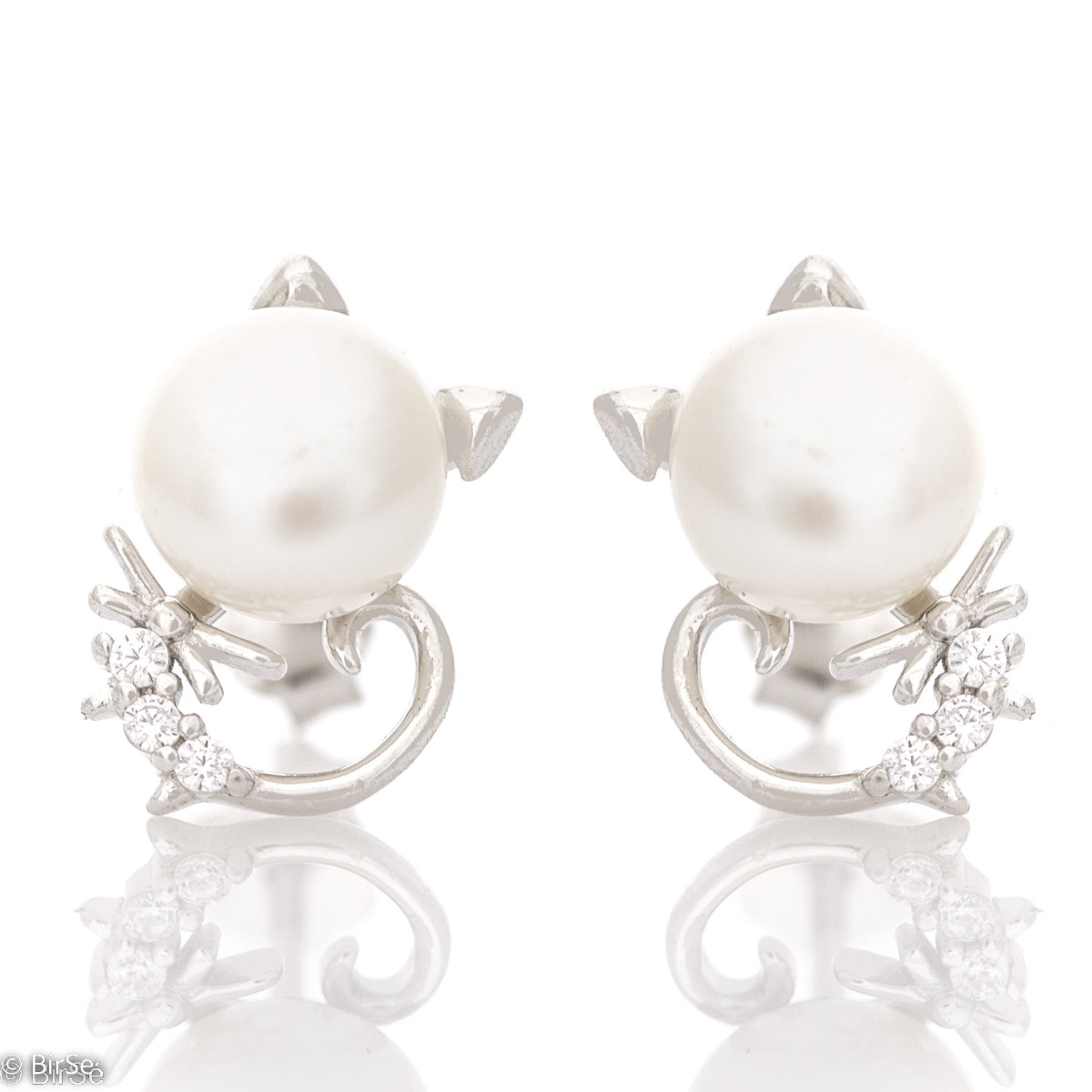 Adorable kitten earrings, elegantly crafted from sparkling rhodium silver. A beautiful white pearl in the company of fine zircons form the delicate earrings, which are suitable for little and big girls.