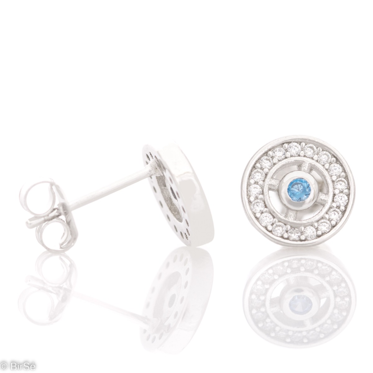 Charming women's earrings, masterfully crafted from fine rhodium silver with an elegant blue stone in the center. The elements are beautifully sculpted, dazzling zircons sparkle charmingly, and the pin fastening is comfortable and practical.