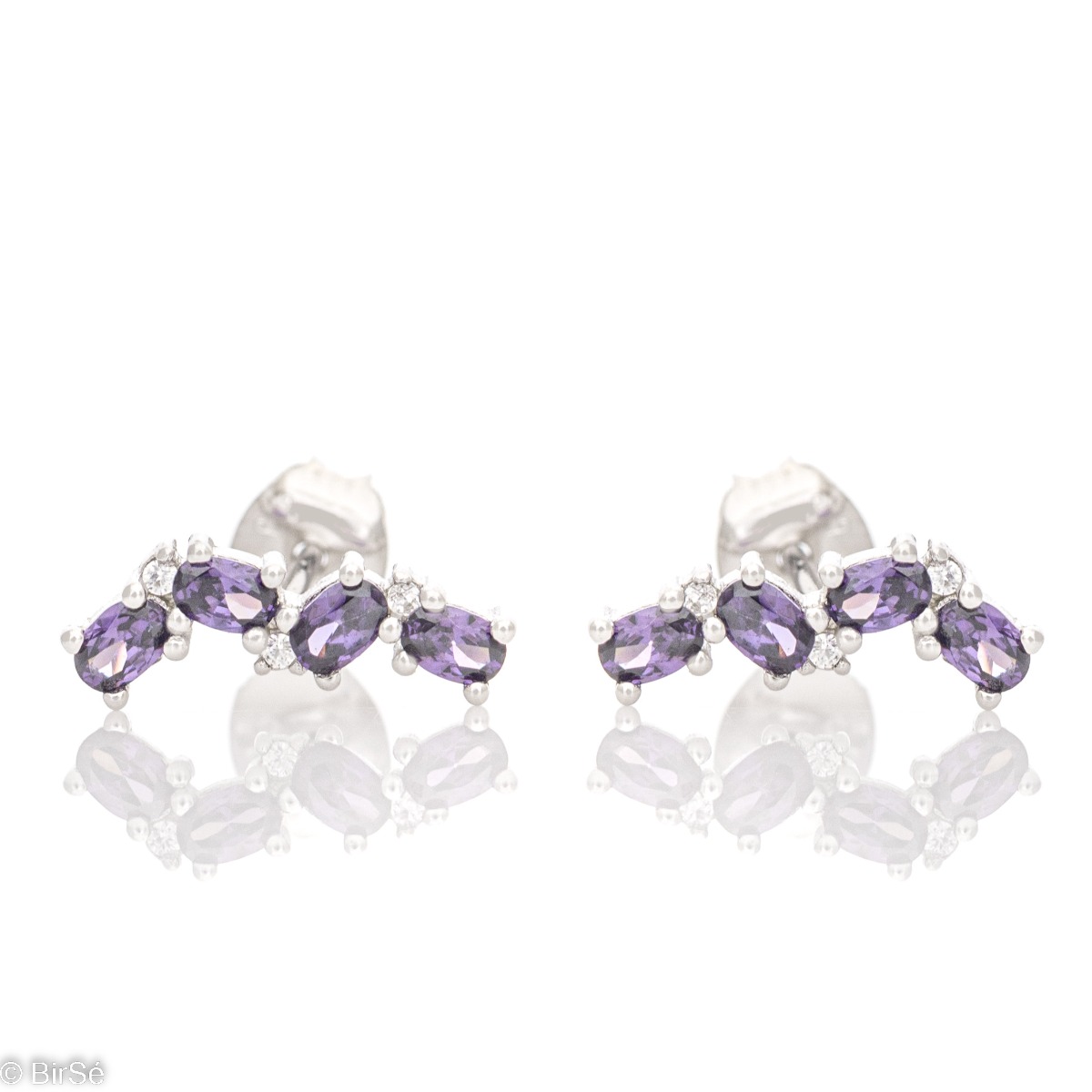 Fine silver earrings with an elegant pattern. Beautiful soft purple zircons are the main accent of the earrings, made with a pin fastening and suitable for ladies of all ages.