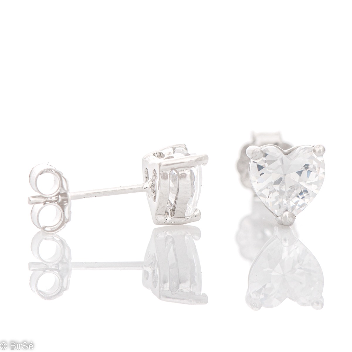 Exquisite earrings made of fine silver in the shape of a heart, in a delicate combination with an enchanted zircon. Fastening with a pin is for more convenience, and the earrings are a suitable gift for the beloved girl.