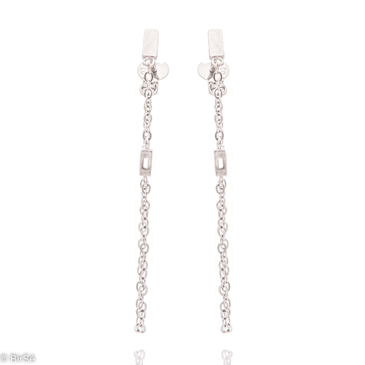 A simple model of women's dangling earrings with an elegant design, completely formed by combining a classic rhodium silver chain with a sparkling zircon. The fastening is with a pin - comfortable and practical.