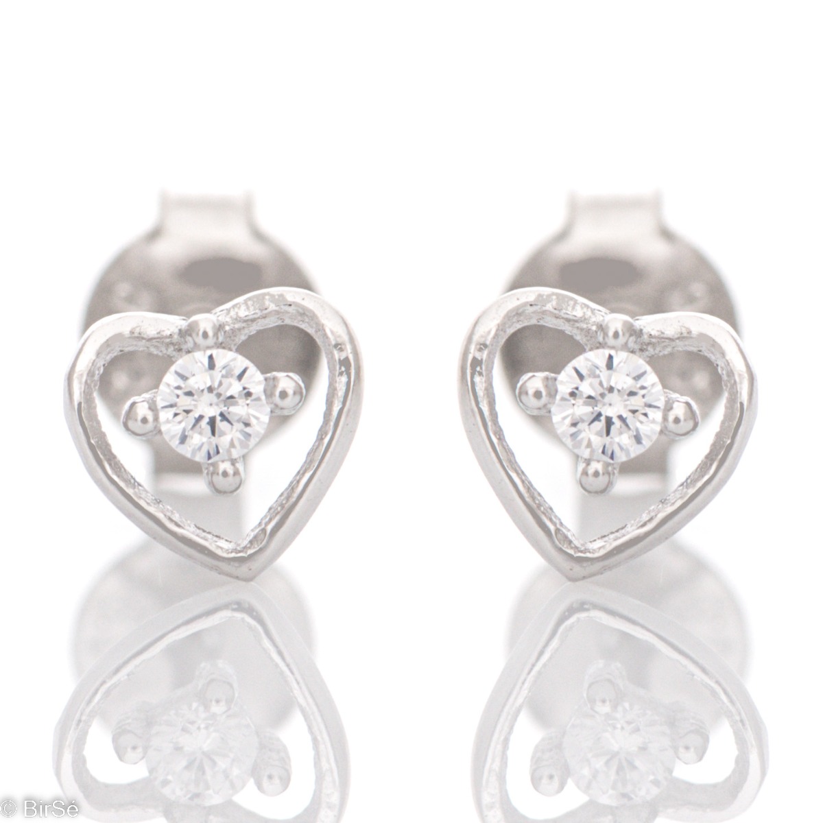 Spectacular ladies' earrings in rhodium-plated silver in the shape of a heart, decorated with a dazzling cubic zirconia. The earrings have a convenient pin fastening, suitable for little girls.