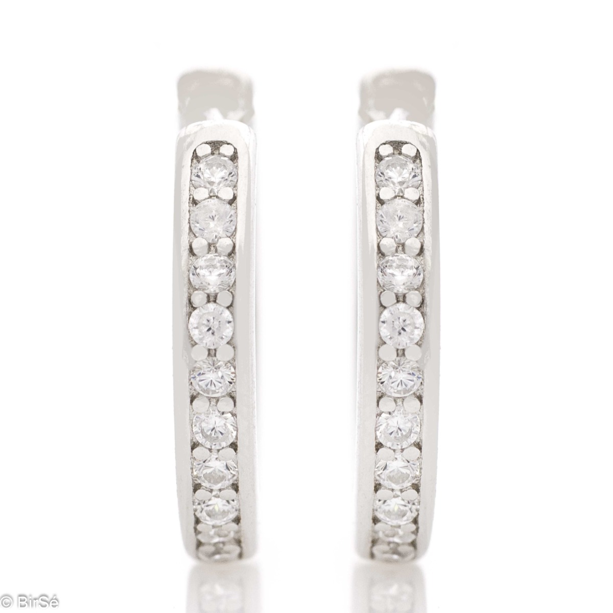 Spectacular women's earrings made of rhodium silver delicate rings. The rings are fully embellished with dazzling zircons and the English clasp makes them extremely comfortable.