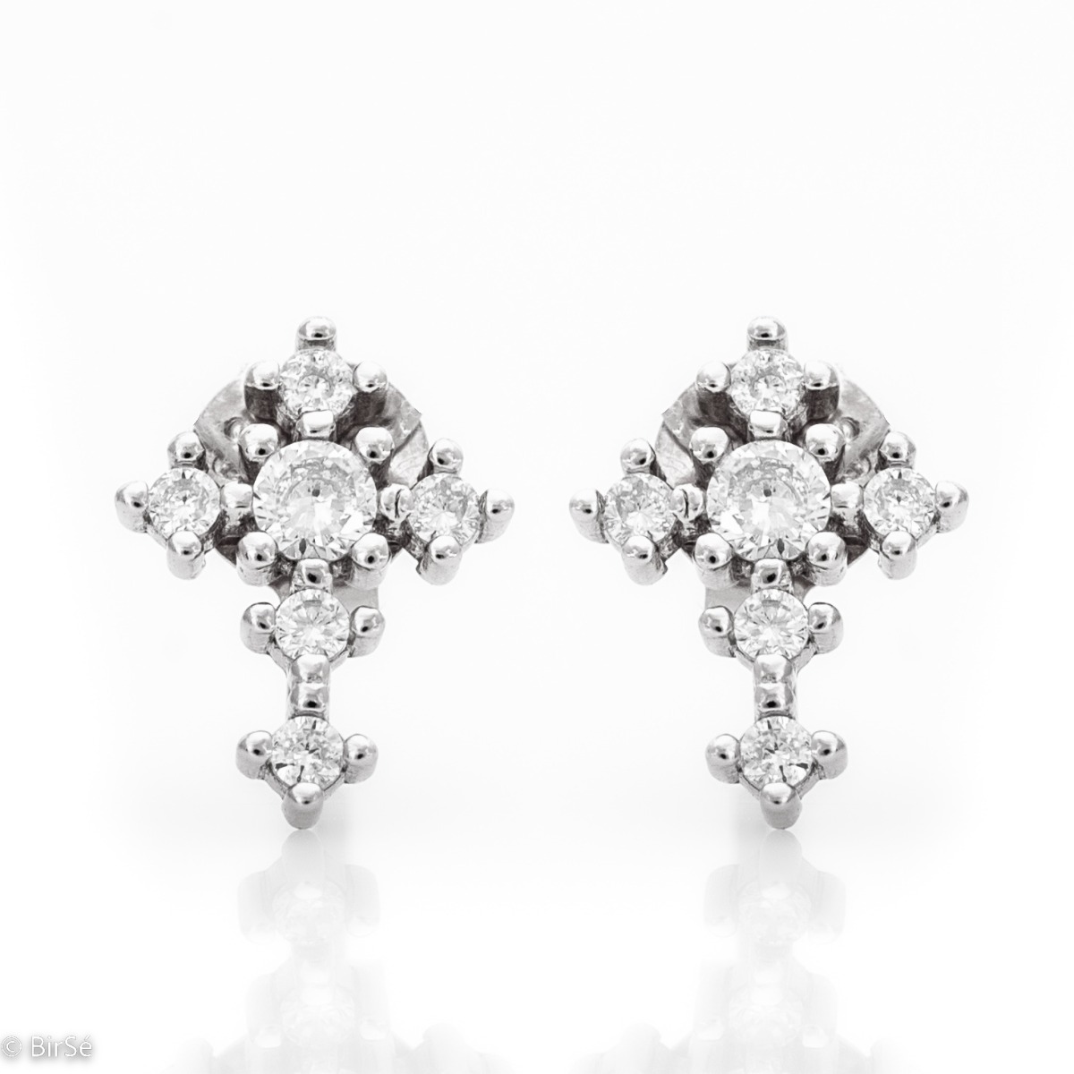 Exquisite workmanship of ladies' earrings, with a base of fine rhodium silver in the form of a cross. Dazzling zircons add a dazzling charm to the jewelry. Suitable for ladies of all ages due to its comfortable pin fastening.