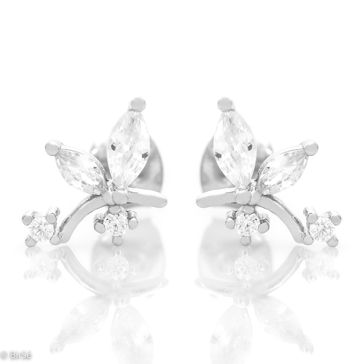 A charming model of silver stud earrings. Crafted from fine rhodium silver and embellished with zircons, the delicate earrings are a beautiful gift for stylish ladies.