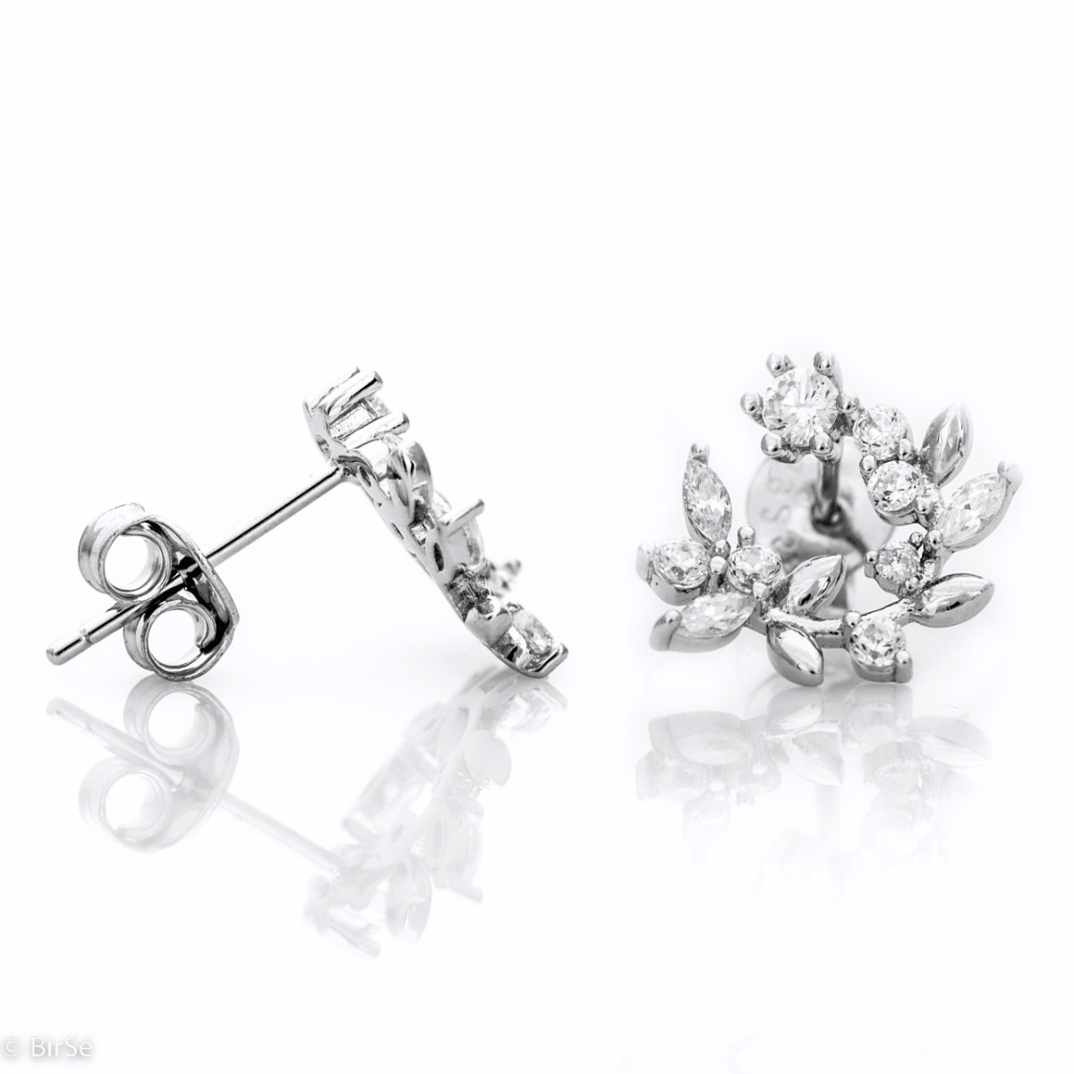 Extremely delicate women's stud earrings with an exquisite shape, complemented by sparkling zircons and precise craftsmanship entirely in rhodium-plated silver. A lovely gift for a beloved woman.