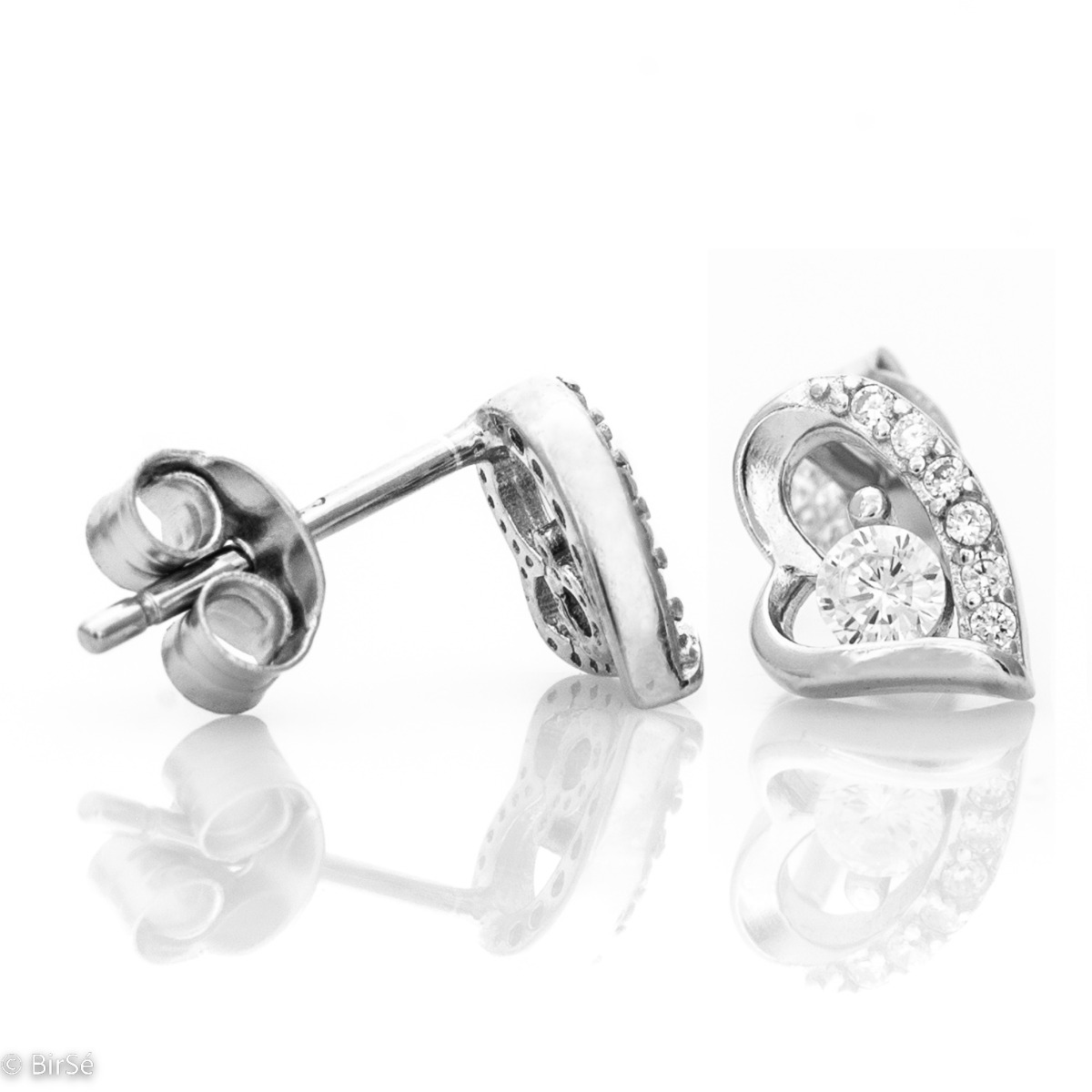 Delicate silver stud earrings with exquisite workmanship all in rhodium silver on a beautiful heart studded with zircons. A lovely gift for a beloved woman. All jewelry is gift-wrapped and accompanied by a certificate of quality and warranty.