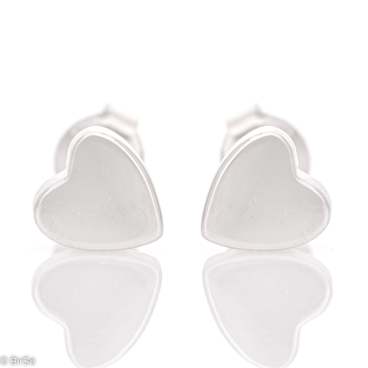 Extremely fine silver earrings with precise craftsmanship entirely from rhodium-plated silver and a delicately shaped heart. Fastening is with a pin - extremely comfortable and practical. In a charming ring set with the same look.