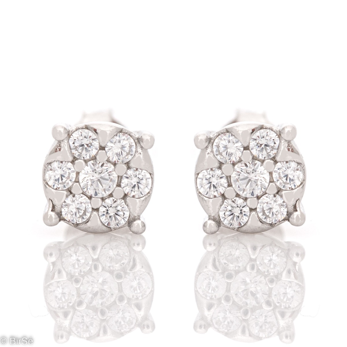 An elegant model of silver earrings decorated with sparkling zircons. Fastening with a pin - convenient and practical. Suitable for your everyday life or to please your favorite child.