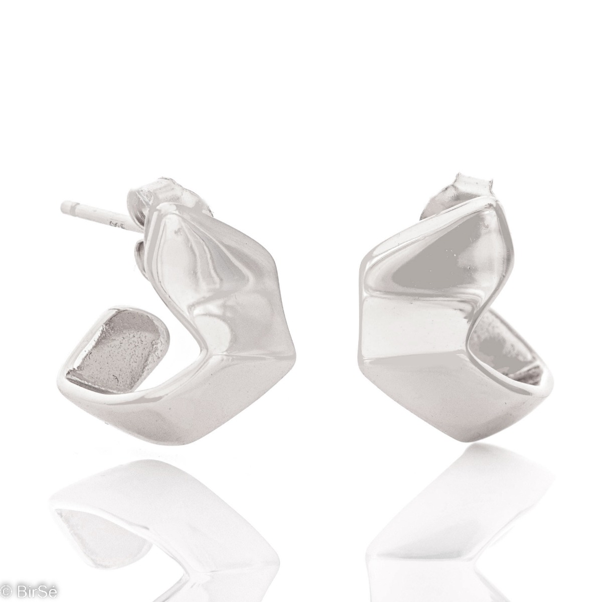 Extravagantly crafted women's earrings in elegant rhodium silver with a non-standard shape and pin fastening.