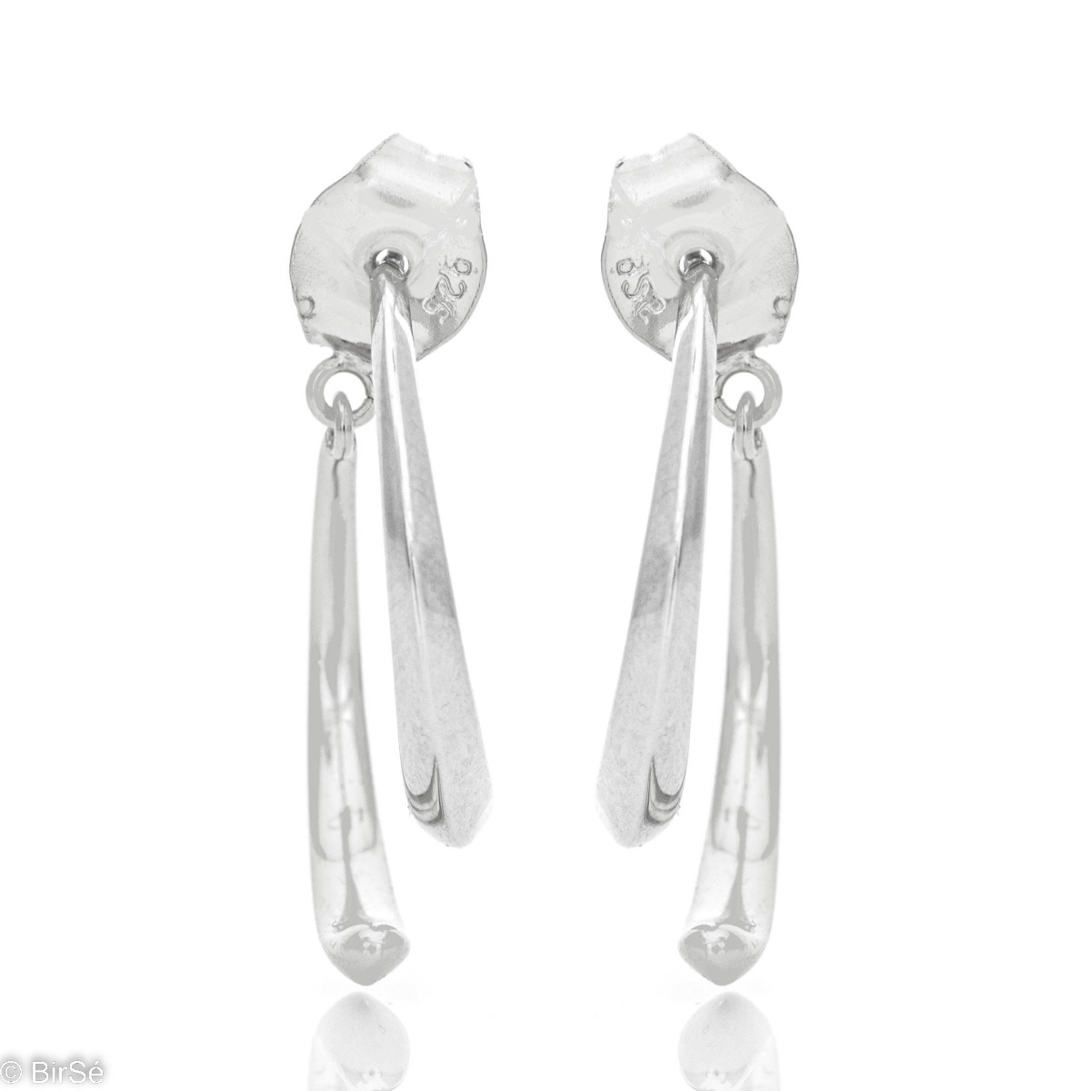 Extravagant silver earring design, a combination of two crescent-shaped pieces that elegantly connect in a pin clasp.