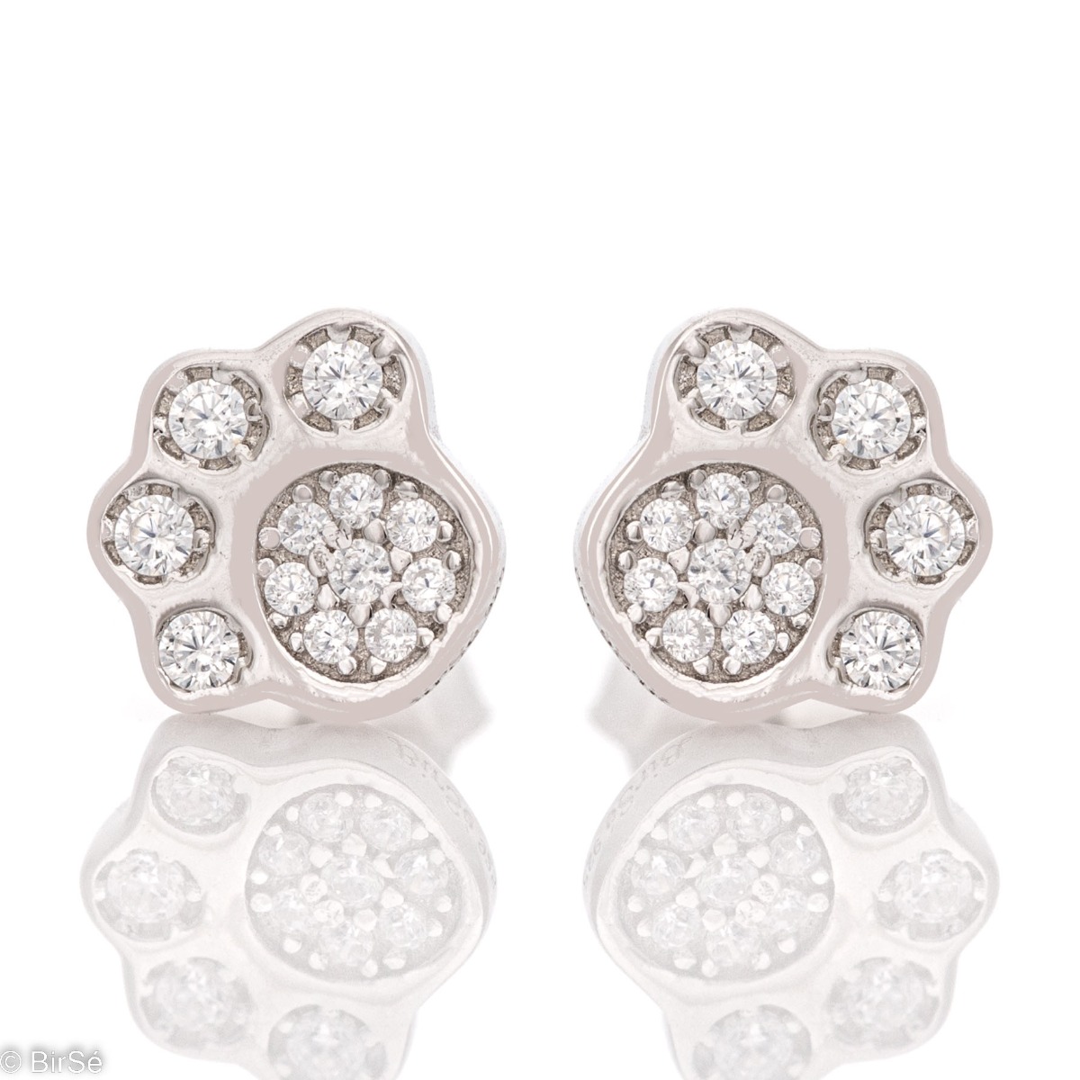 Charming earrings in fine rhodium-plated silver in the shape of a paw, delicately decorated with zircons. The earrings are also suitable for children with the convenient pin fastening.