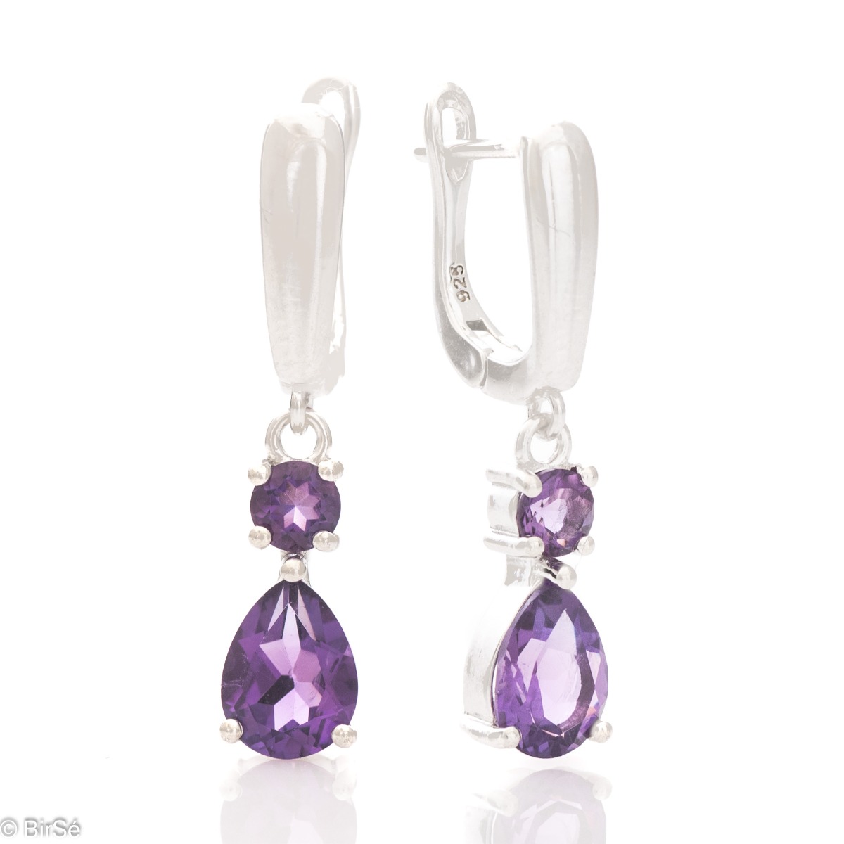 Natural Amethyst Sterling Silver Earrings - Exquisite English Clasp Dangle Earrings. Finely cast silver and majestic natural drop-shaped amethyst. Complete with a ring and pendant with the same elegant design.